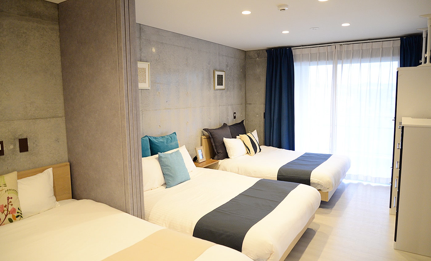 北谷 コンドミニアムホテル 寝室