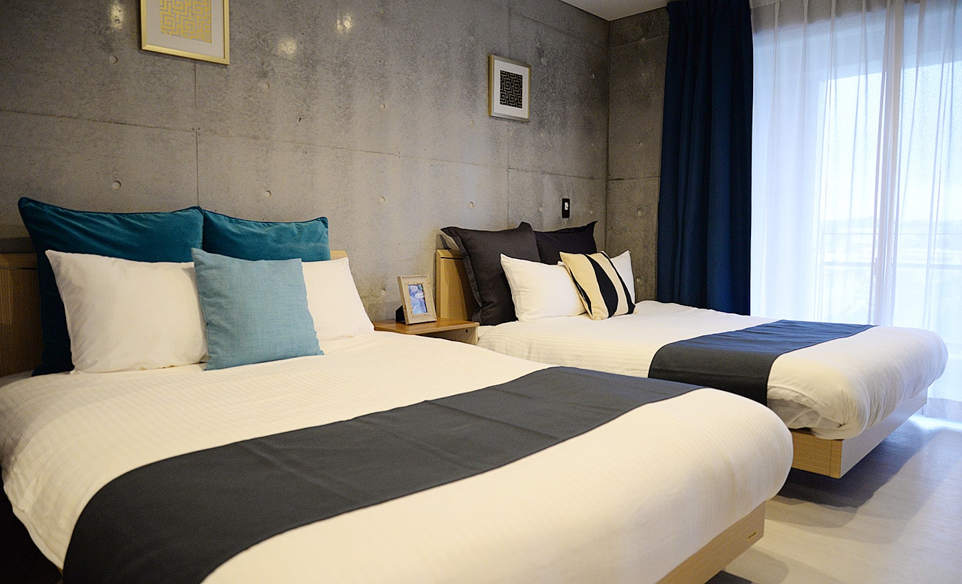 北谷 コンドミニアムホテル 寝室