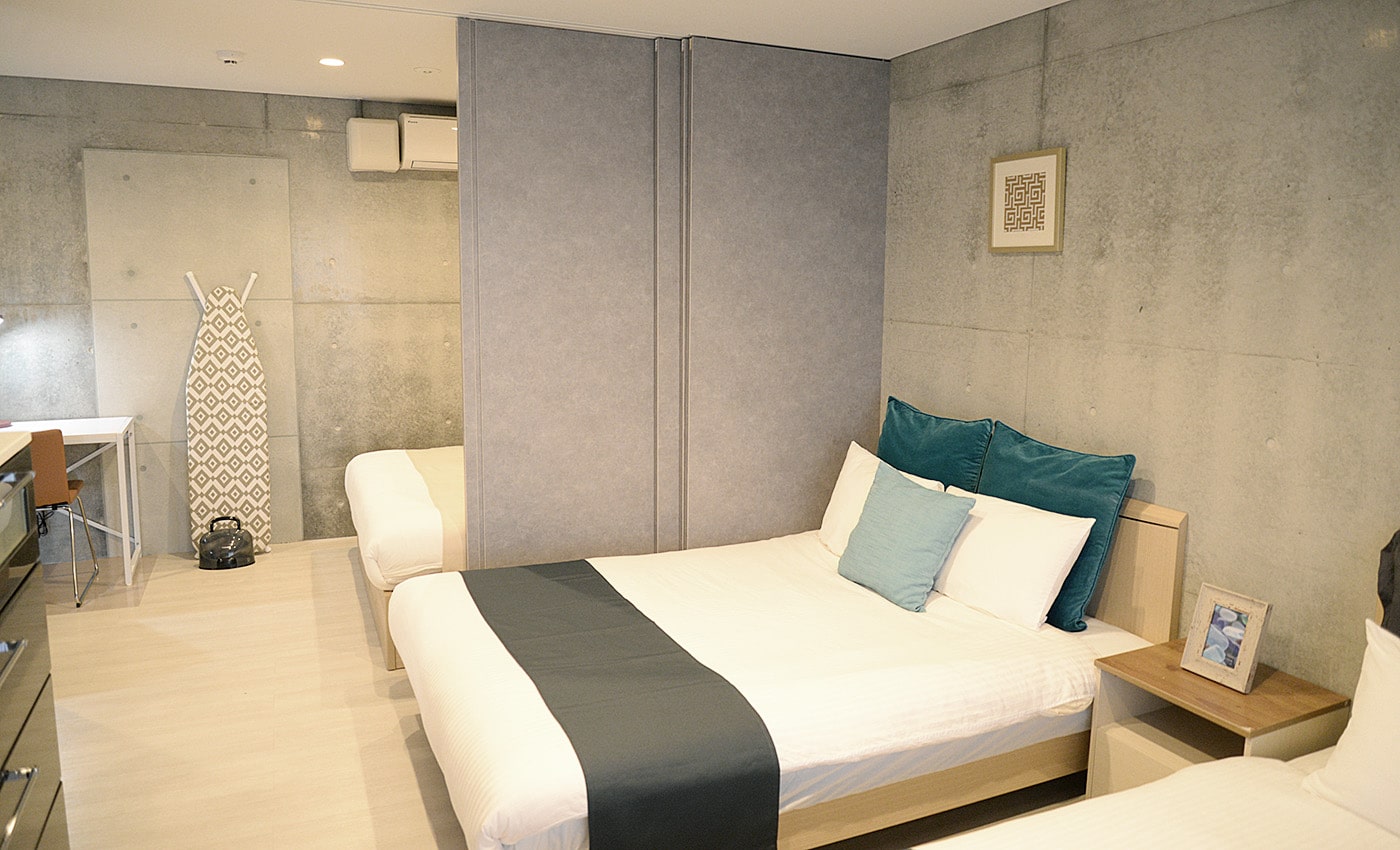 北谷 コンドミニアムホテル 寝室